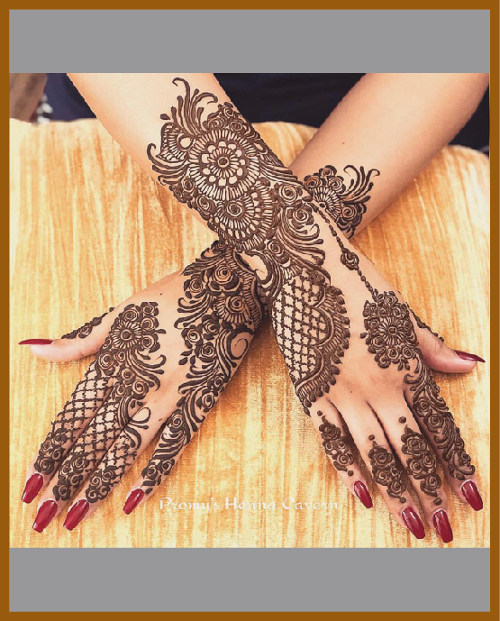 Stylish Back Hand Mehndi Layout With Ornamental Detailing
